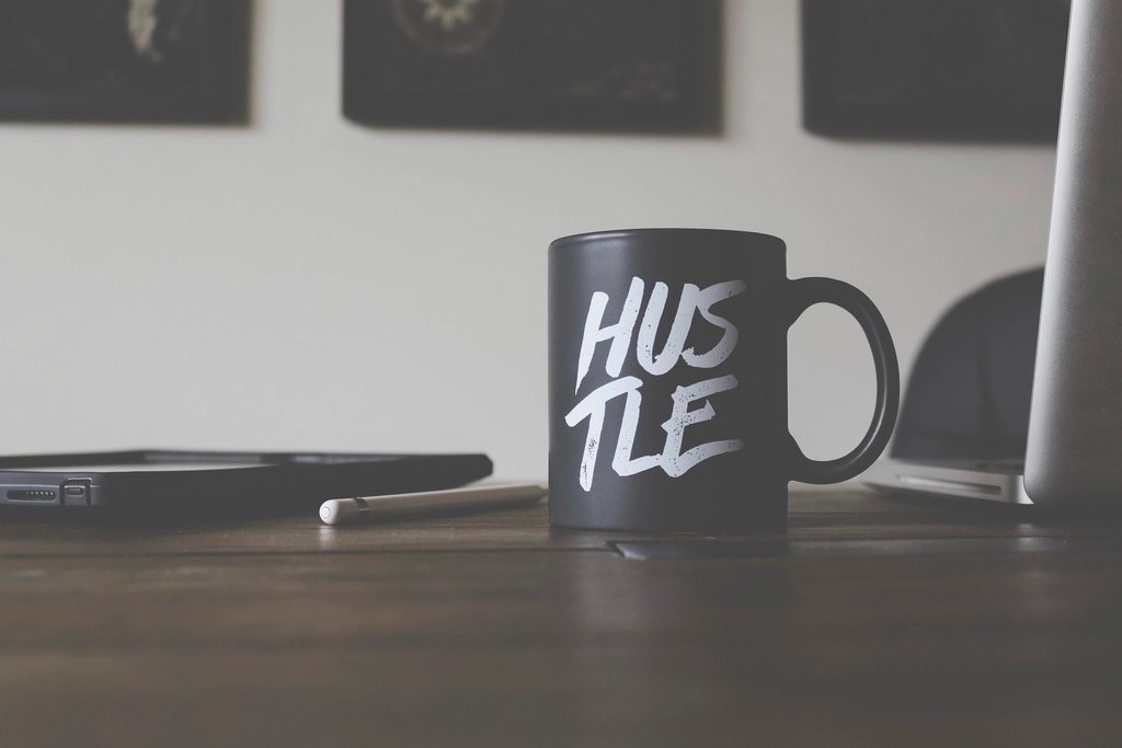 black mug sitting office desk